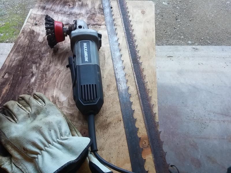 Knotted wire cup brush makes quick work.