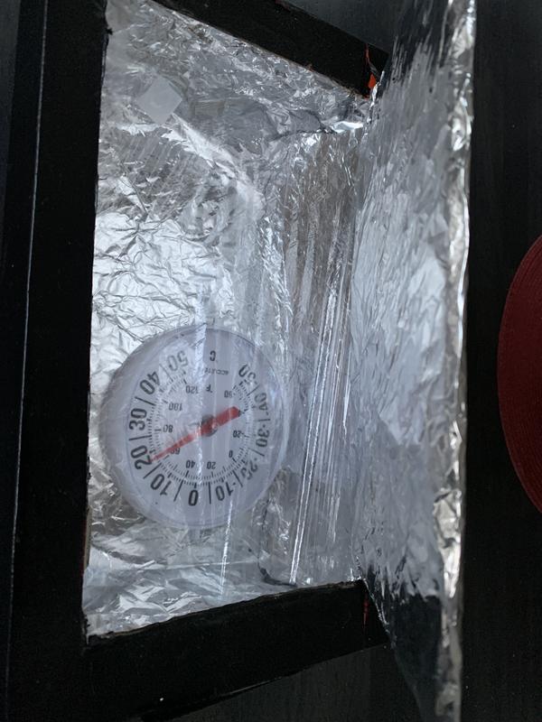 Thermometer in solar box.