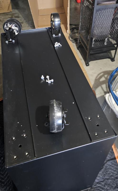 Two wheels attached, 3 wheels total, bolts for the missing wheel.