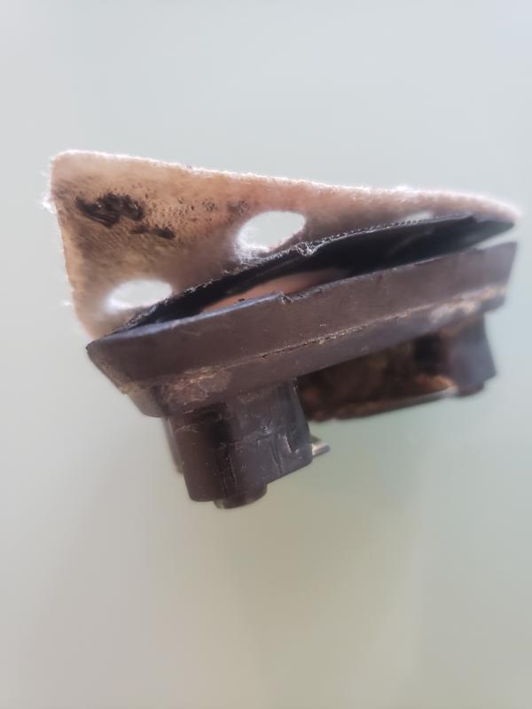 sandpaper and 'sticky' layer pulling away from sanding head