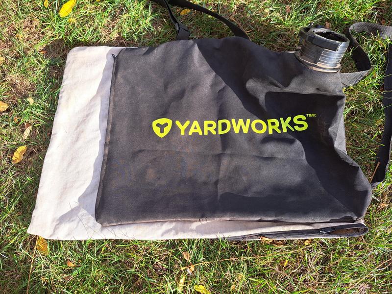 Provided bag (19 in x 25 in) overlying old bag from Toro Rake & Vac 51549