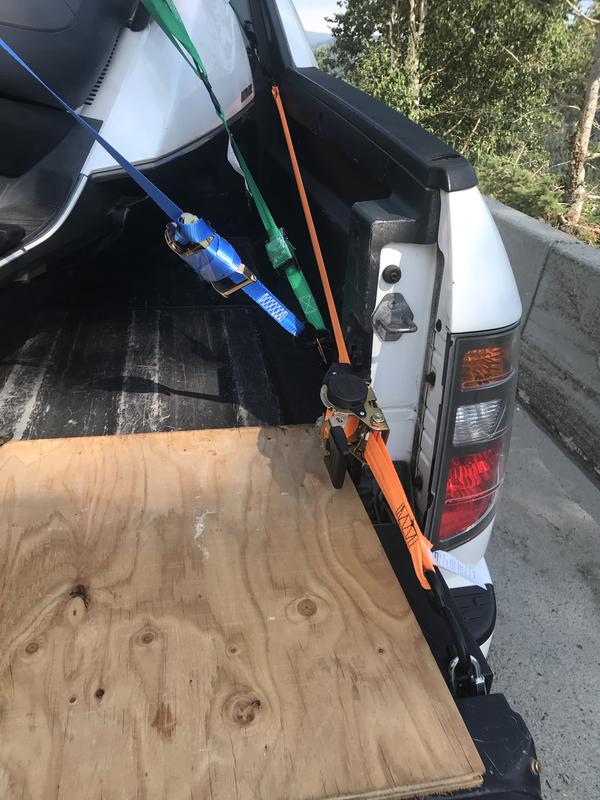 Bike that wasn't supposed to fit in a Ridgeline. The straps worked better than expected, simple with no extra strap flying about while doing 130 km over the mountain pass and over-strong for what was required.