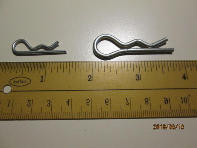 original r-clip at left