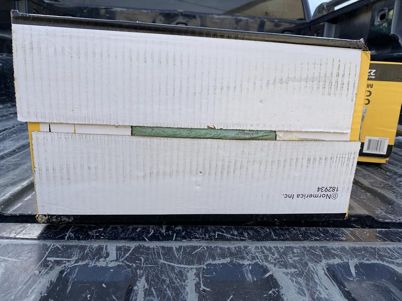 Zoom in to right of green liner to view hole.  This is a common failure found in this package.