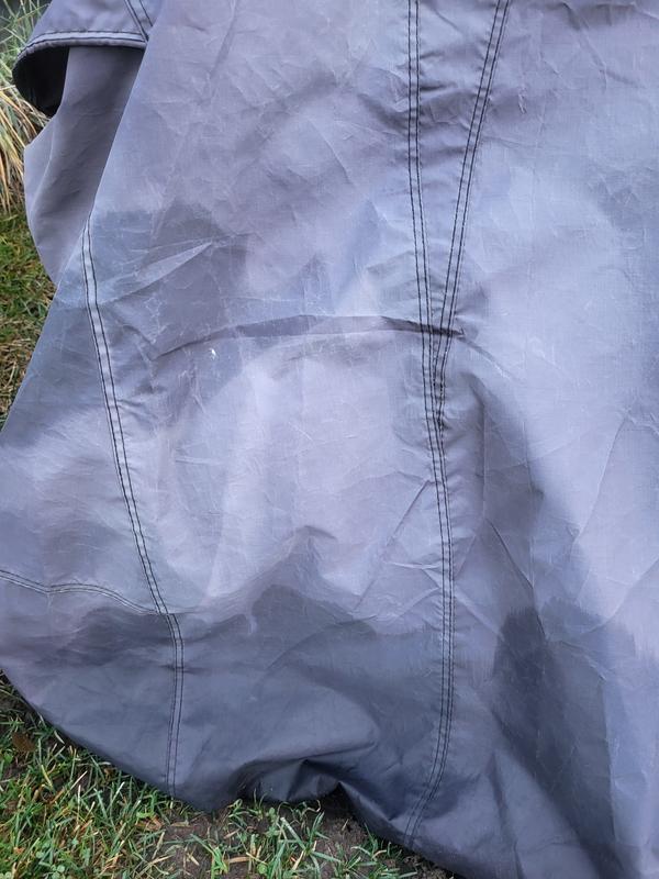 Cracked, soaked, was black but faded within a year.