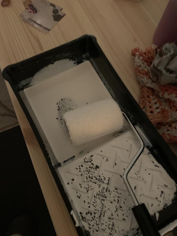 The eggshell contrasted a lot with the paint that was on my studio wall. I had to do that whole wall with this tiny can and this tiny roller and I did it! Good paint!