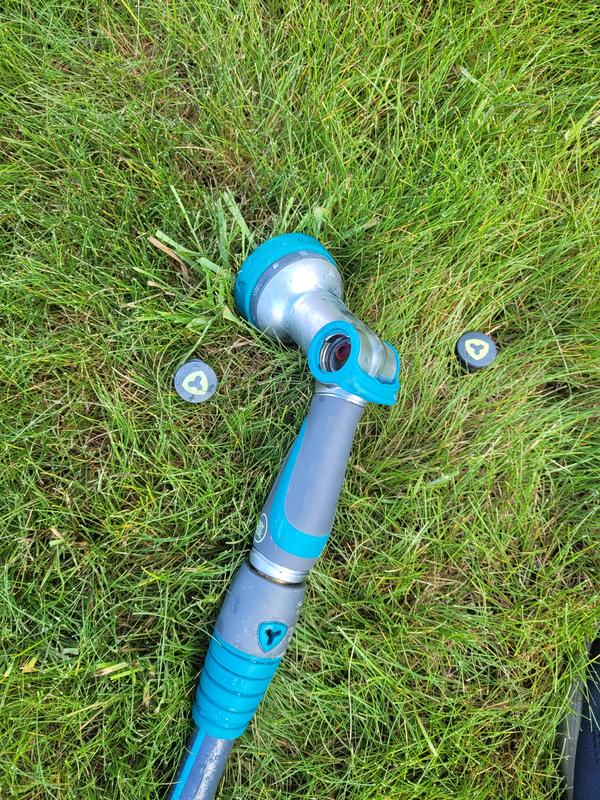 The water was spraying out the sides from the main part of the nozzle (not where it connects to the hose, but the actual body of the nozzle itself).