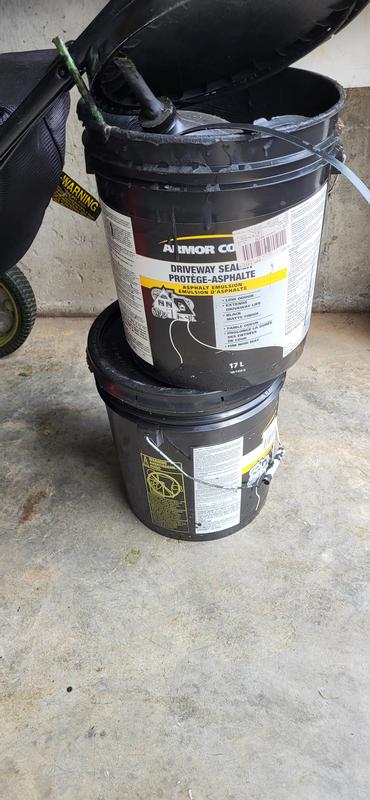 Two buckets of Armor sealers