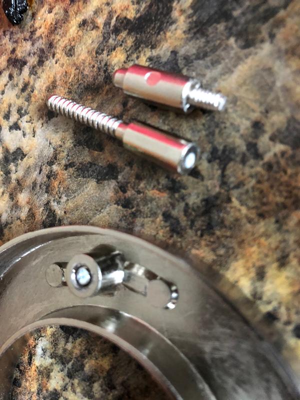 Both attachment screws broken