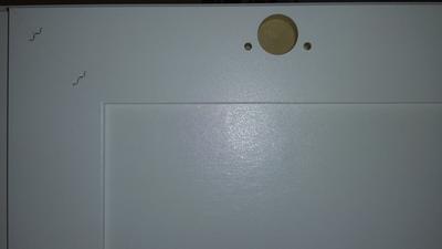 Hard to show but frame is pressboard and inside frame is flimsy cardboard!