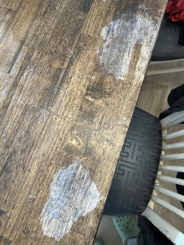 Photos of my table after 10 minutes of playing with the slime. The last photo is 20 minutes after the slime was put away and the table was cleaned.