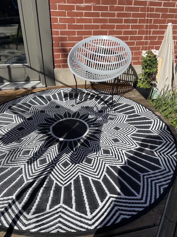 Rug on back deck with chair