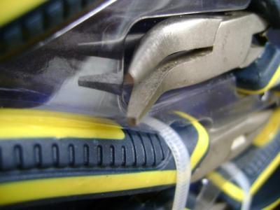 Flat inner surface (not indented) would make it hard to grip objects.