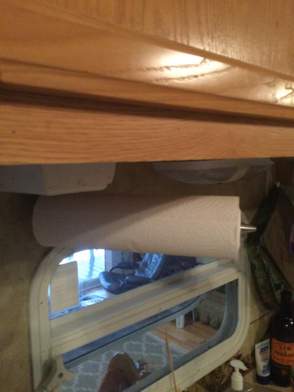 Our paper towel holder under cabinets in trailer.