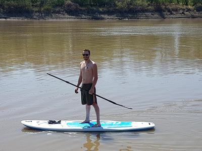 Paddle boarding on the Red River