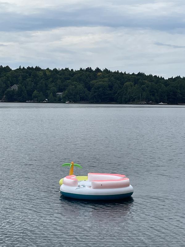 Dwarfing a 2 person floaty in the background