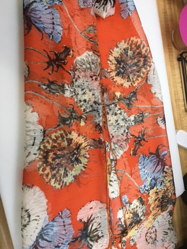 Scarf made by serging a rolled hem using a 72 cent piece of polyester chiffon