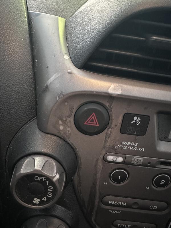 Paint on dash eaten through