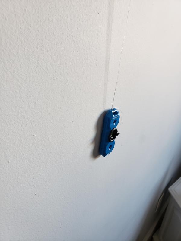 Dangle string method on plaster/Lathe. Very strong magnet!