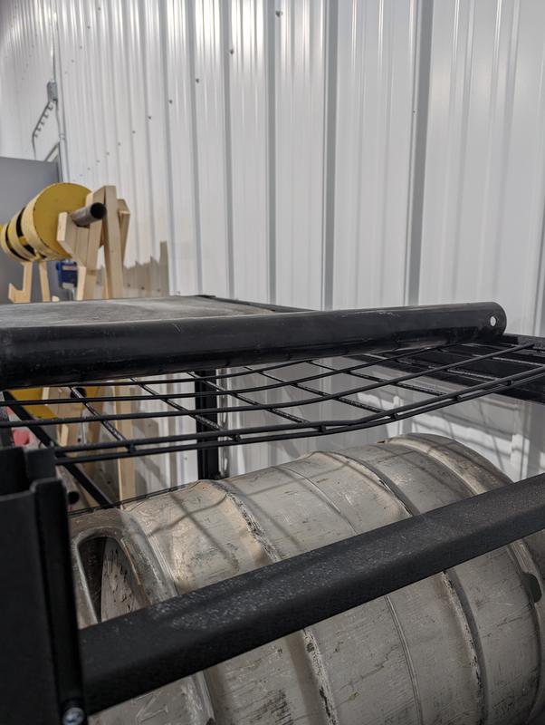 100lb sandbag did this even with an extra layer of material to help distribute the load. That half of the shelf is bent over an inch