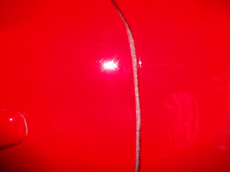 After polish (10 min application) reduced scratches (not bad for a 11 year old car!)