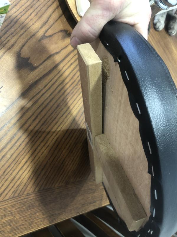 Glue held but grains of wood on panel board separated