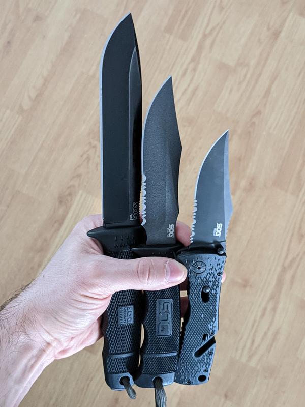 SOG SEAL Pup (middle) compared to full-sized Force and Trident folder.