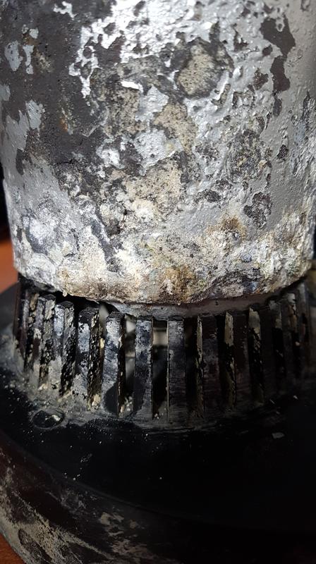 Motor separates from base from corrosion.