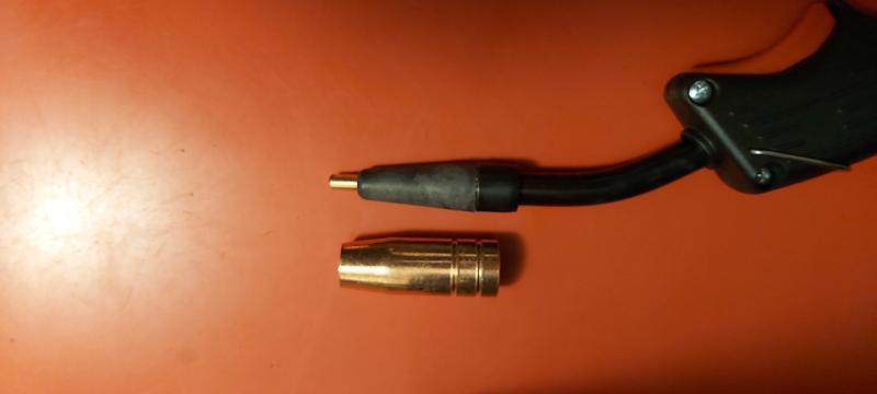 MIG nozzle that came with is removed, Lincoln flux nozzle installed.