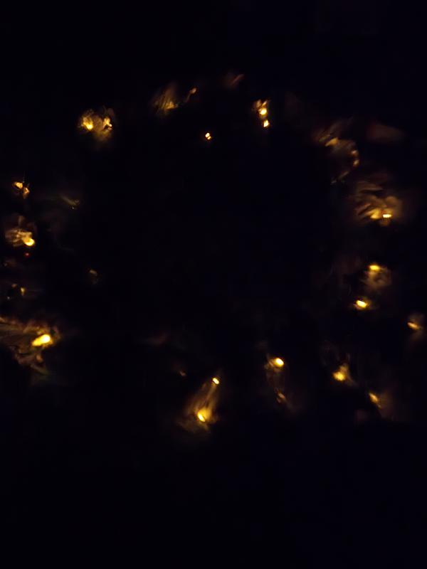 You can't see the bulbs unless you are standing right in front of the wreath