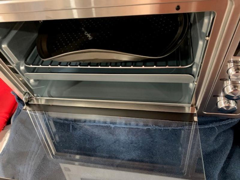 Have to bend 12" pizza pan to make it fit.