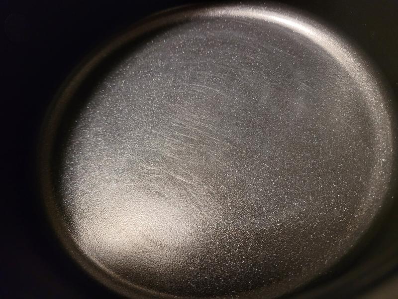 The scratches from the wooden spoon