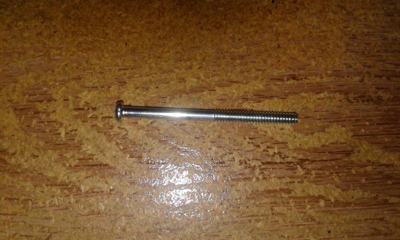 Screw removed so I could plug it into the Decora outlet