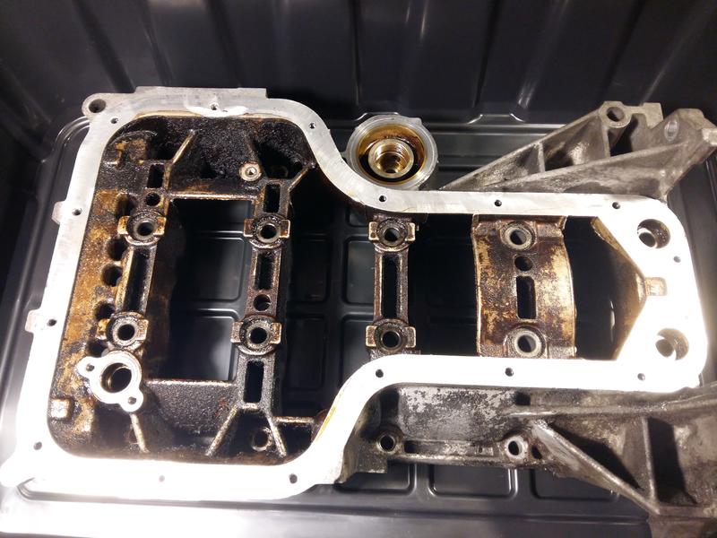 Bearing-cap subassembly prior to soaking in solvent.