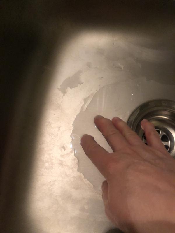 Water always present in bottom of sink because it does not drain