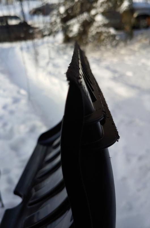 Looking down the straight leading edge of my snow shovel blade.