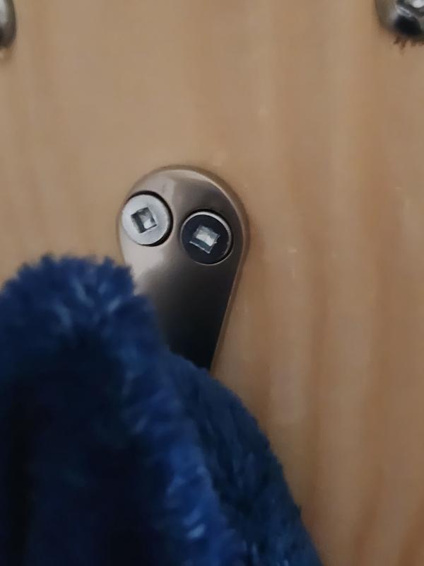 Three of the 5 hooks I put up with screws. Have enough left to hang three more hooks