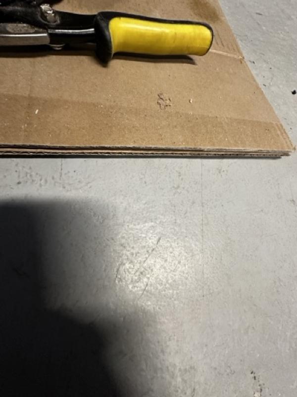 Heavy use area with heavy caster wheels often rolling and scraping in shoppe