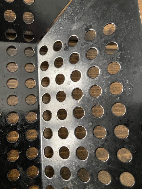 Scratched easily and grease won’t come off without taking coating off