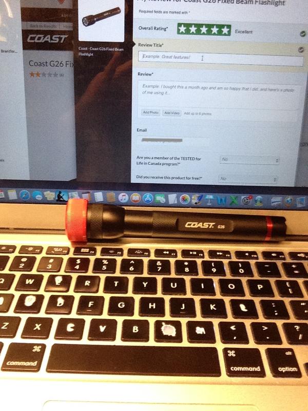 Coast G26 with red plastic bottle cap fitted over the light source -- for night vision use