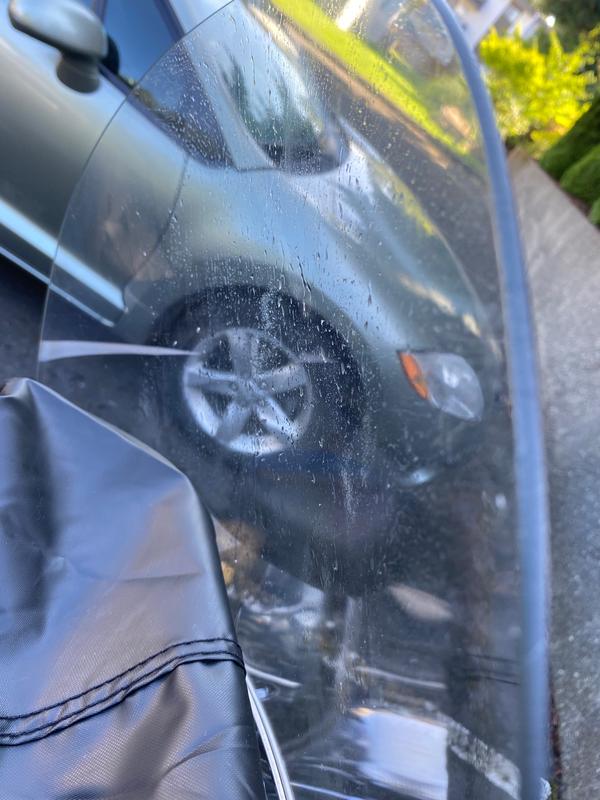 Removed cover, water all over windshield. Cover was also wet throughout the inside, with water all over the bike.