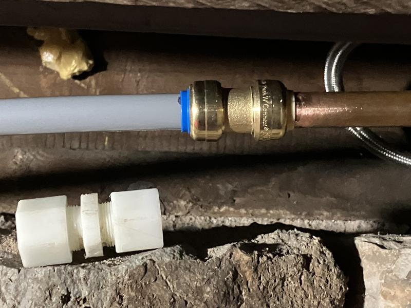 Old fittings (white) and new installed fitting