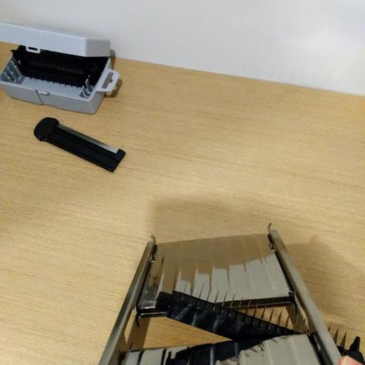 watch your hands while you force to fit the julienne blade in! It pops vertically in the center.