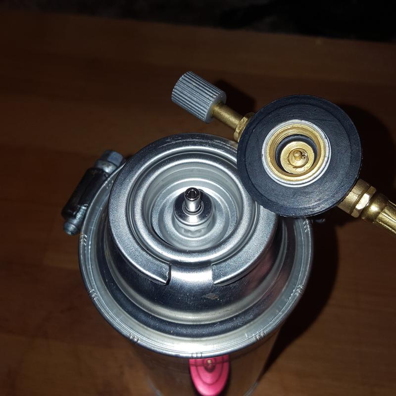 A normal camping gas stove uses a "Lindal" screw on valve and will not work on the butane