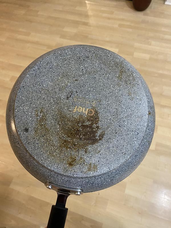 Bottom of the pan is burnt after less than a week of use