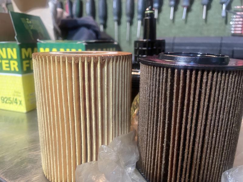 Used filter, black top fits 1998 BMW Z3 2.8. Mann filter on left, clean does not to tall