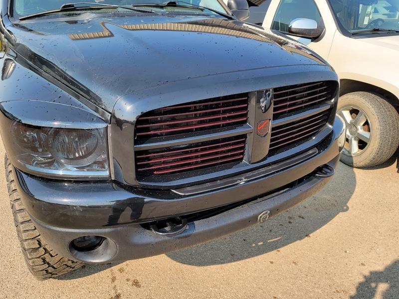 Pxr Color matched grill, with a inferno red inserts tinted darker, clearcoat after. All Dupli-Color.