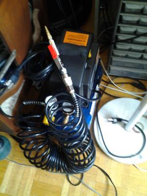 sitting on the floor beside the work table