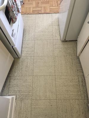 After: no splotches, but some deep marks in tile are still dirty. Some tiles, with shallower marks, are significantly cleaner