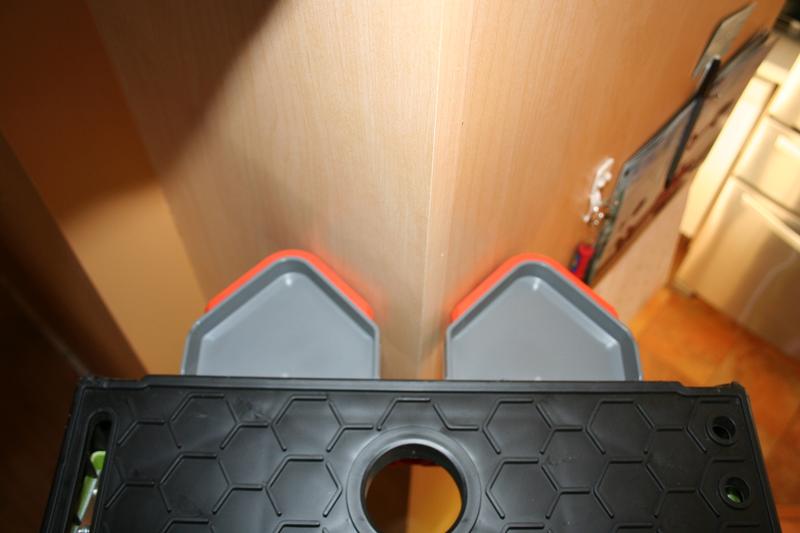 Fits nice and secure in any corner, plus doesn't mark the wall